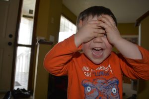 Benjamin covering his eyes. Vacation minimalists