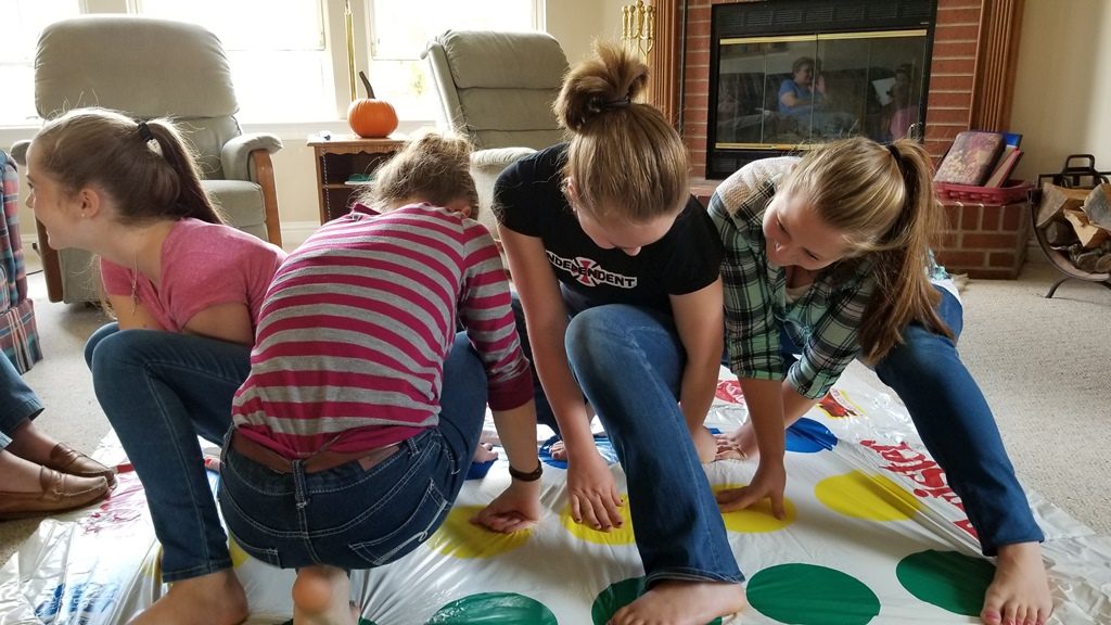 Our kids playing a game together at home